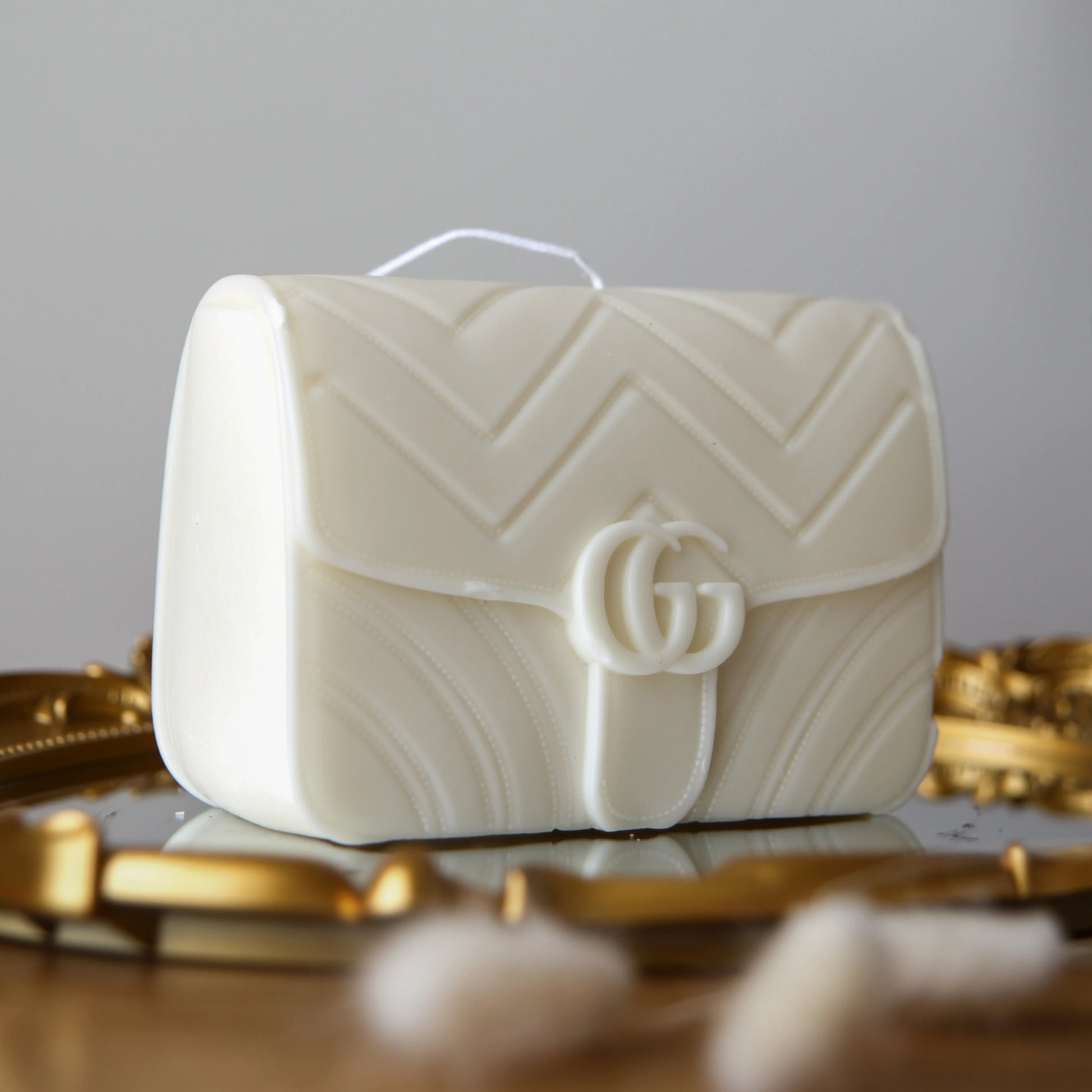 gucci bag candle